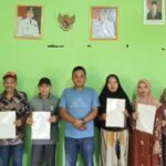 Kantor Pertanahan Hulu Sungai Tengah Serahkan Sertipikat PTSL kepada Masyarakat Desa Abung Surapati